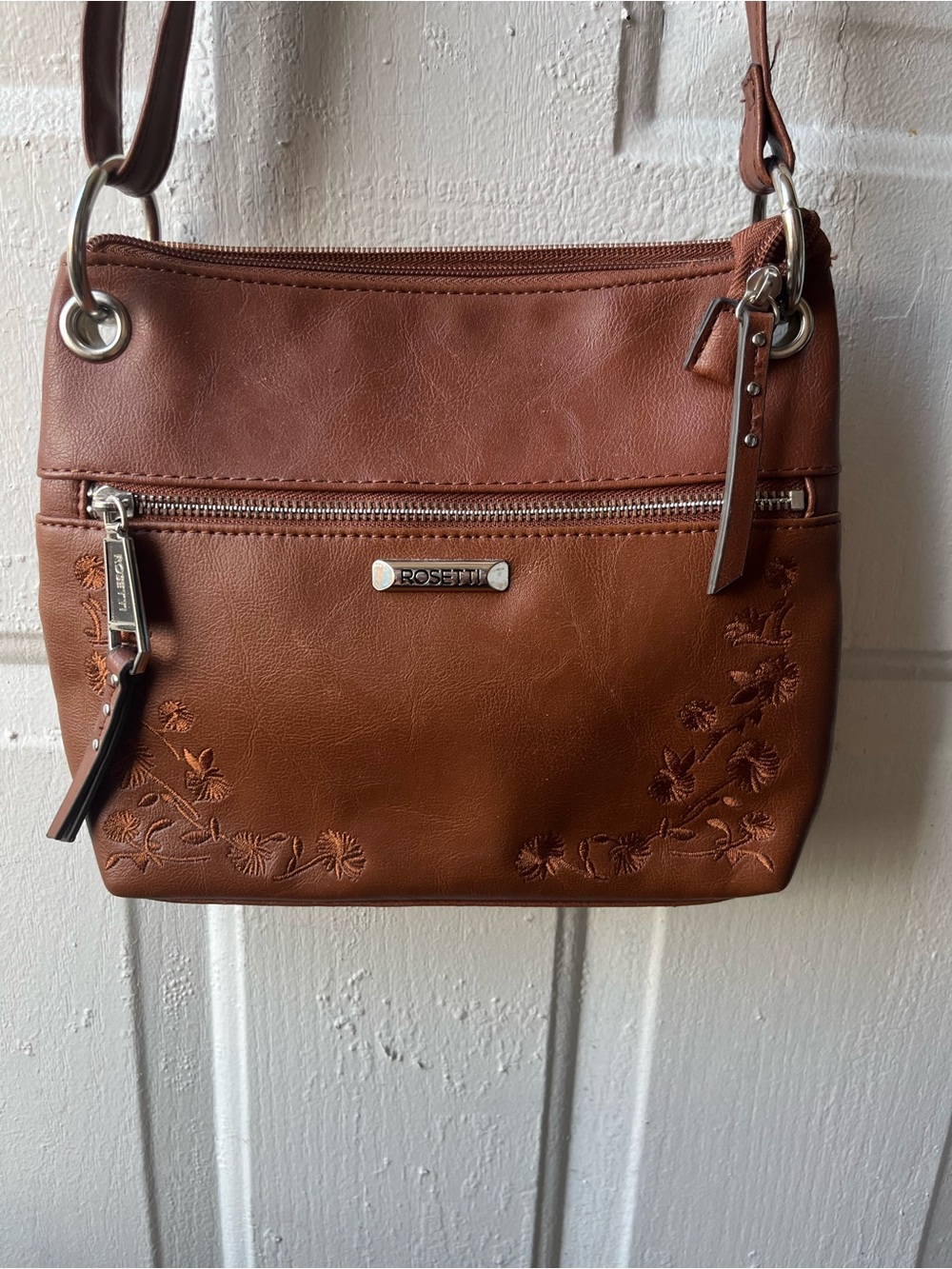 Rosetti Tan Floral-Embossed Crossbody Bag